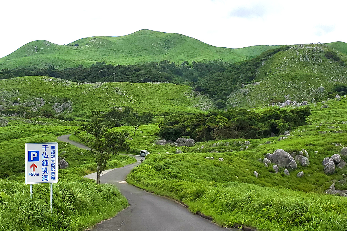 The Senbutsu caves lie beneath the karst plateau where limestone rocks tumble and tumble.