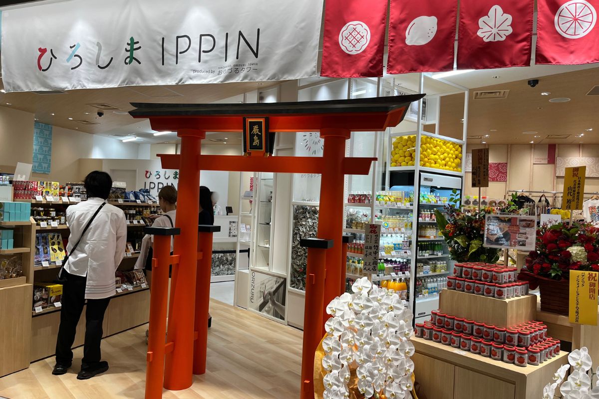 Hiroshima IPPIN” with the red torii of Itsukushima Shrine