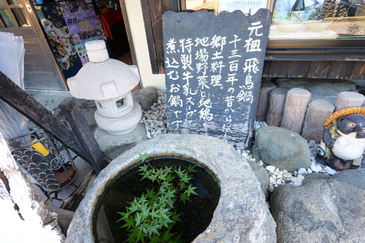 In front of the restaurant, neatly handwritten signs