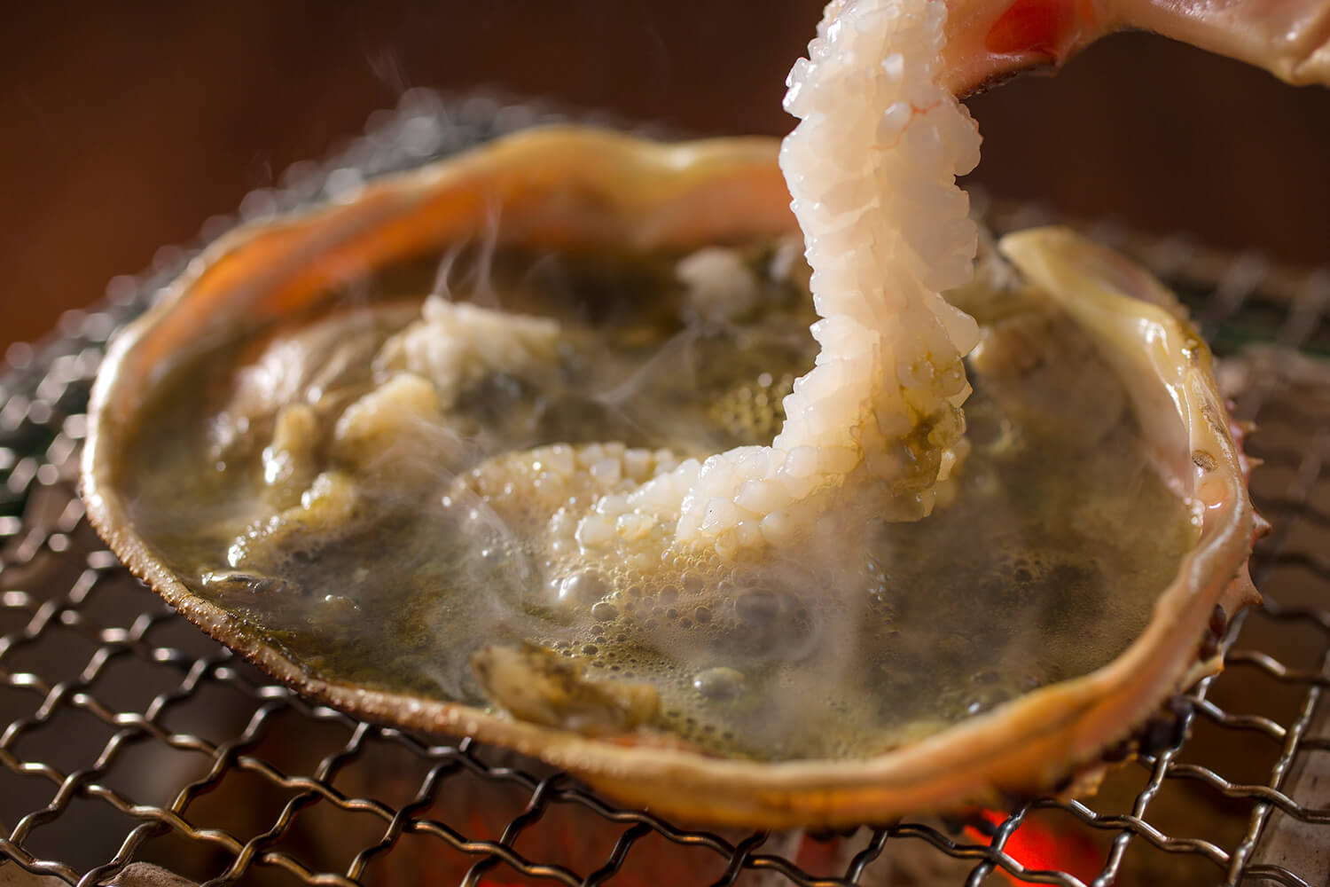 Crab roe baked in its shell is a traditional way to eat it.