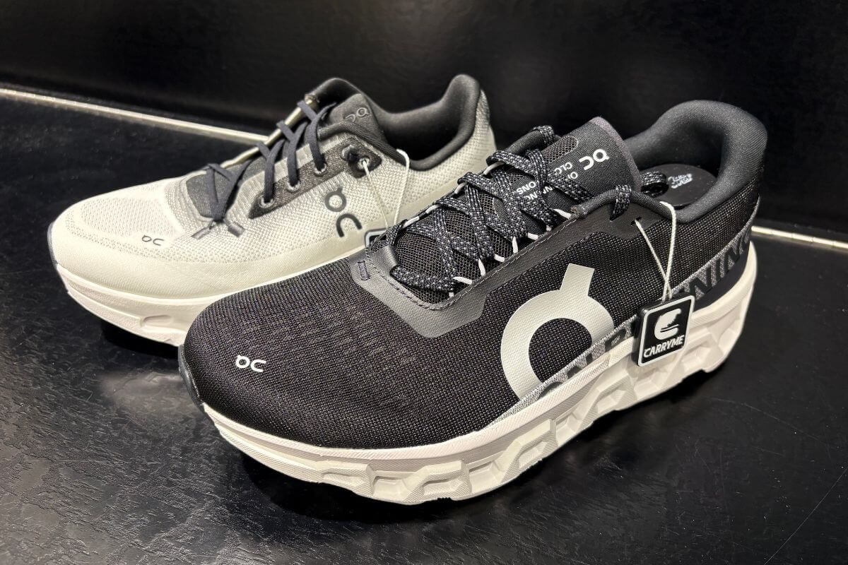 Front: On Cloudmonster 2 Black  Back: On Running Cloudtilt Black Ivory (W)